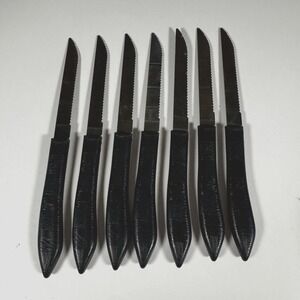 Set of 7 Vintage Quikut Stainless Steak Serrated Knives 8" USA Black Handles MCM
